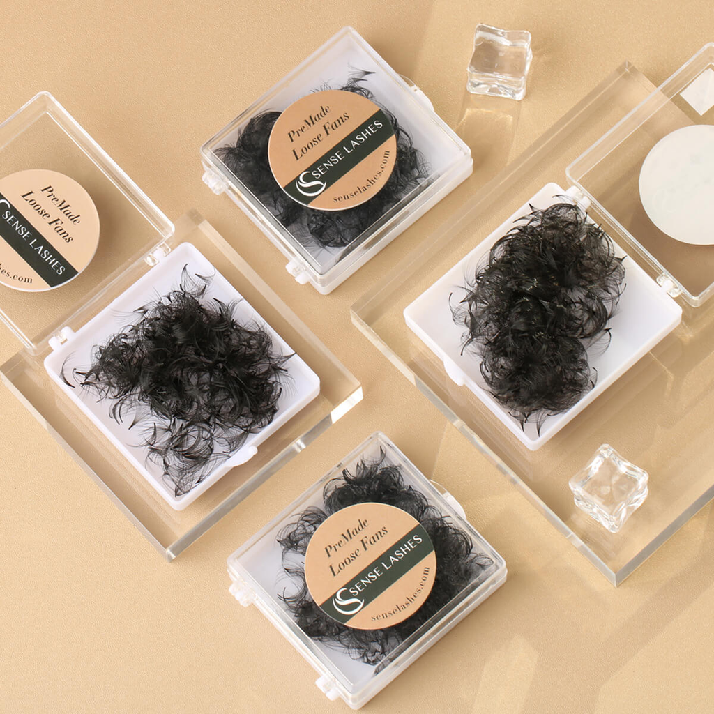Pre-made volume lash fans in open cases, SenseLashes products
