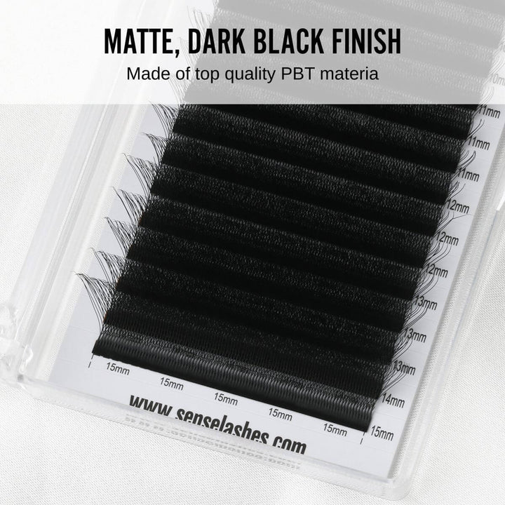 Matte, dark black eyelashes made of high-quality PBT material, displayed in a clear case with size labels.