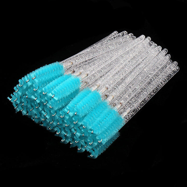 Eyelash mascara brushes with clear glitter handles and turquoise bristles, 50 pieces pack, perfect for lash extensions.