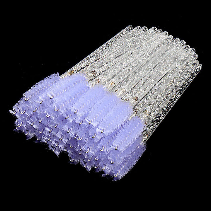 Lavender bristle mascara brushes, 50-piece pack for eyelash extensions. Clear glitter handles, volume & classic lashes.