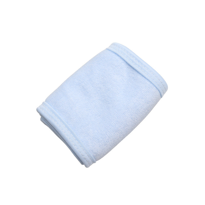 Light blue toweling cloth adjustable headband, ideal for face washing, makeup, yoga and salon use.