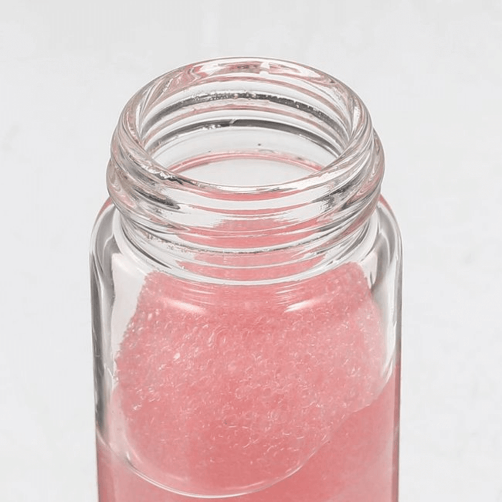 Eyelash extension tweezers cleaner bottle with pink sponge ball, essential tool for lash artists, salon supplies