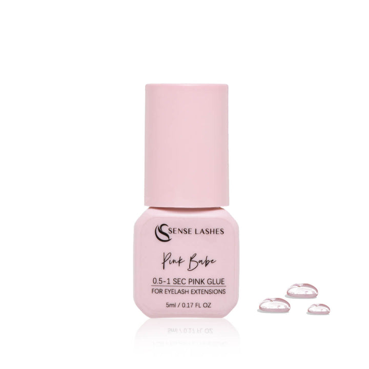 Pink Babe eyelash extension glue by Sense Lashes, ideal for colored lashes and lash art, with 0.5-1 second drying time.