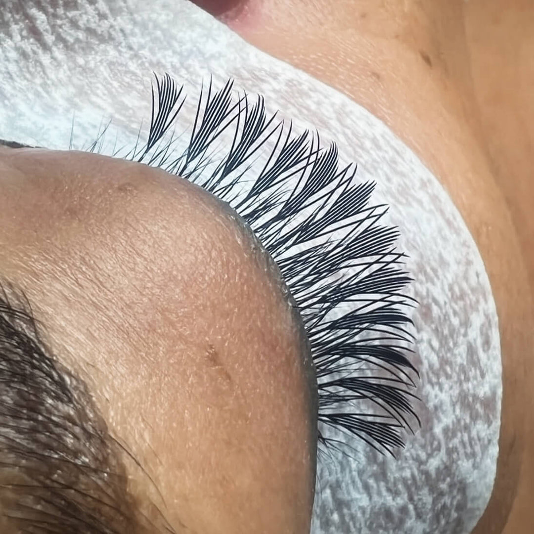 Black premade anime chunk eyelash extensions, creating a bold, spiky lash style for anime looks.