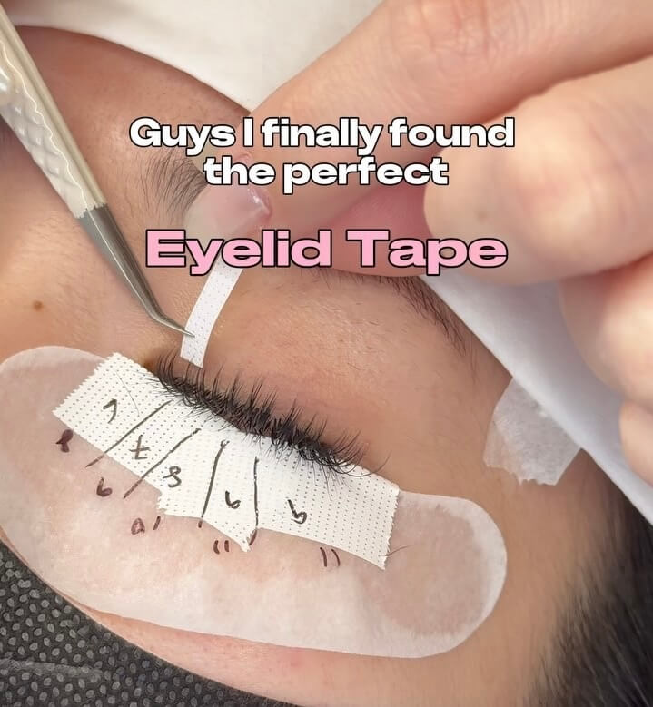 Eyelash extension: slim white eyelid tape used to isolate and protect lower lashes.