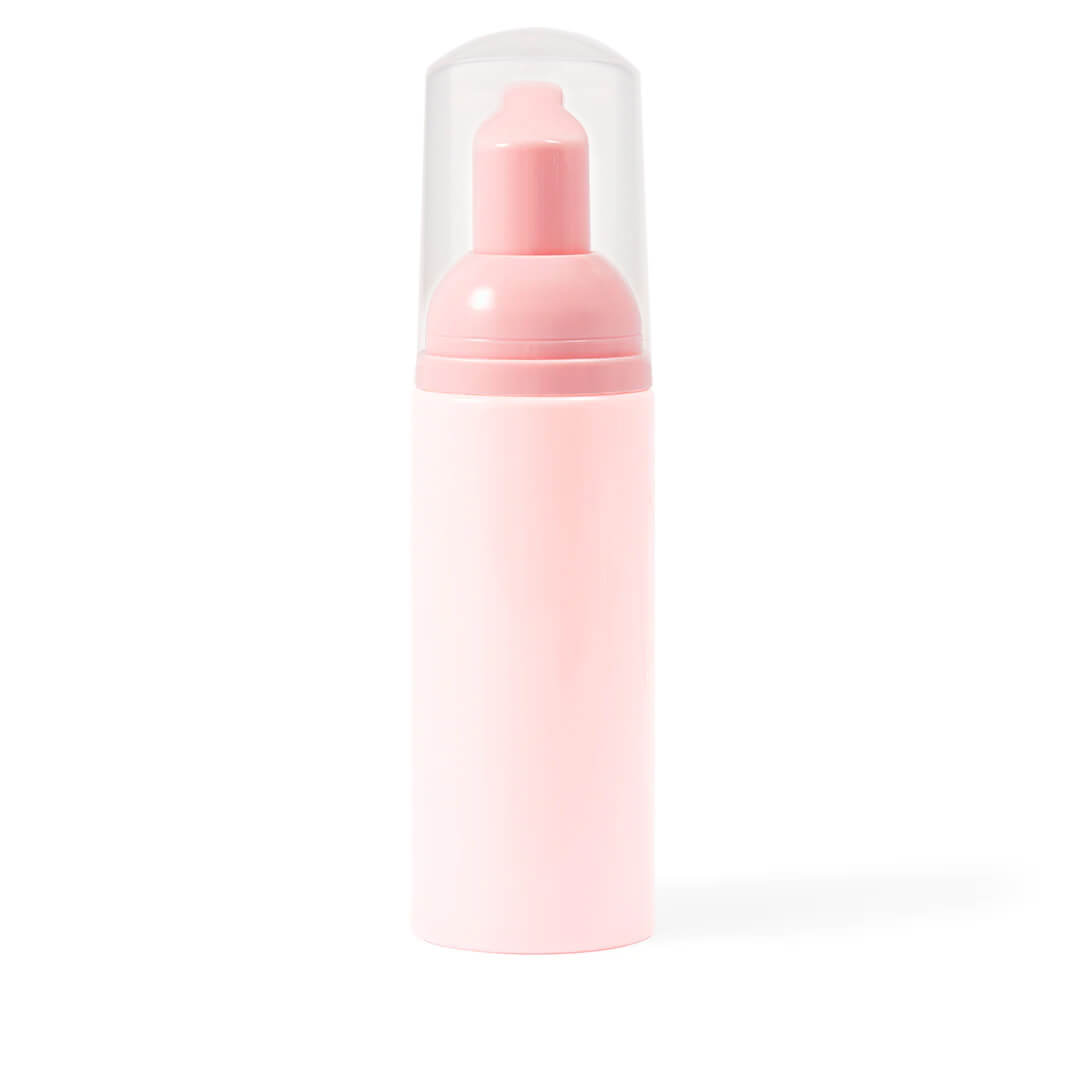 Pink eyelash extension cleanser foam bottle with clear cap, essential lash care product