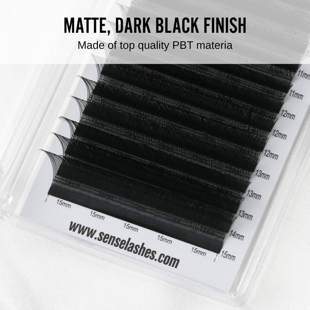 Matte, dark black lashes made of top-quality PBT material, displayed in a clear case with size labels.