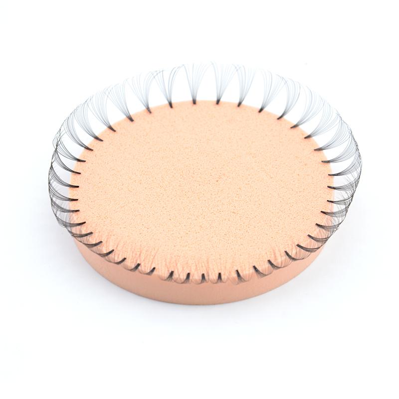 Peach sponge with volume lash fans for easy lash extension arrangement. Professional lash tool for stylists.