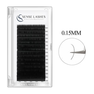 0.15mm classic eyelash extensions from SenseLashes. Black lashes in tray, close-up lash detail. For classic lash.