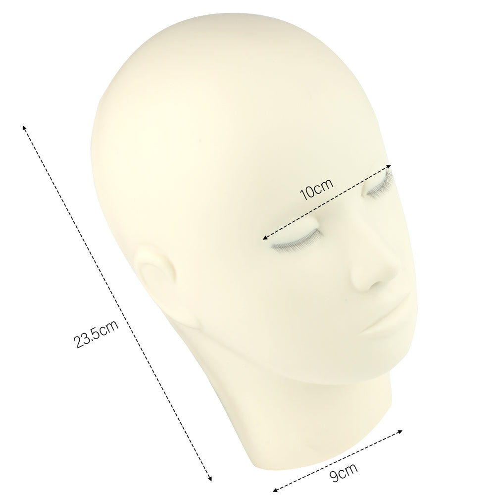 Eyelash extension training mannequin head with dimensions for lash artists. 