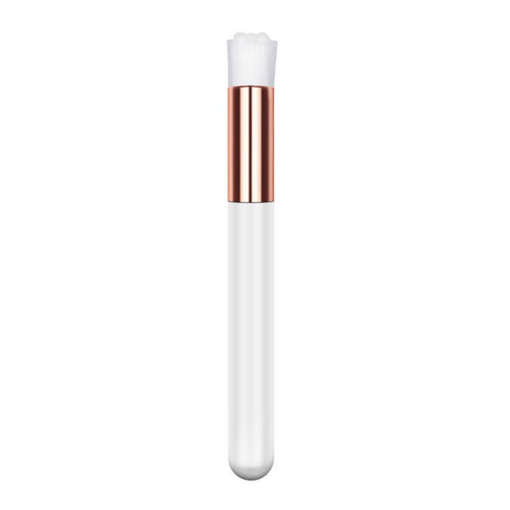 Lash cleansing brush with white handle and soft bristles 