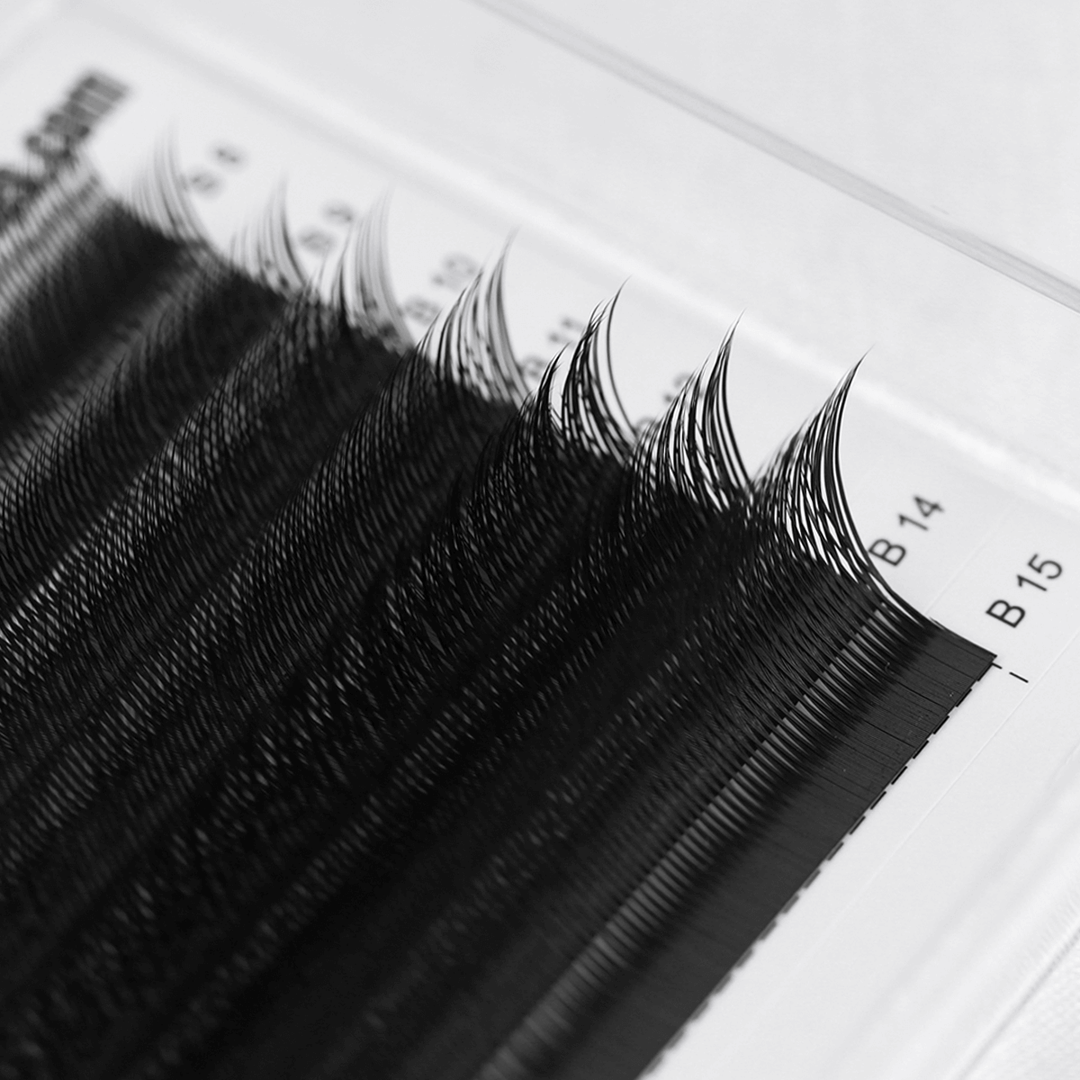 Flirty Kitten Lashes with a lifted, slanted fan design for a sultry cat-eye.