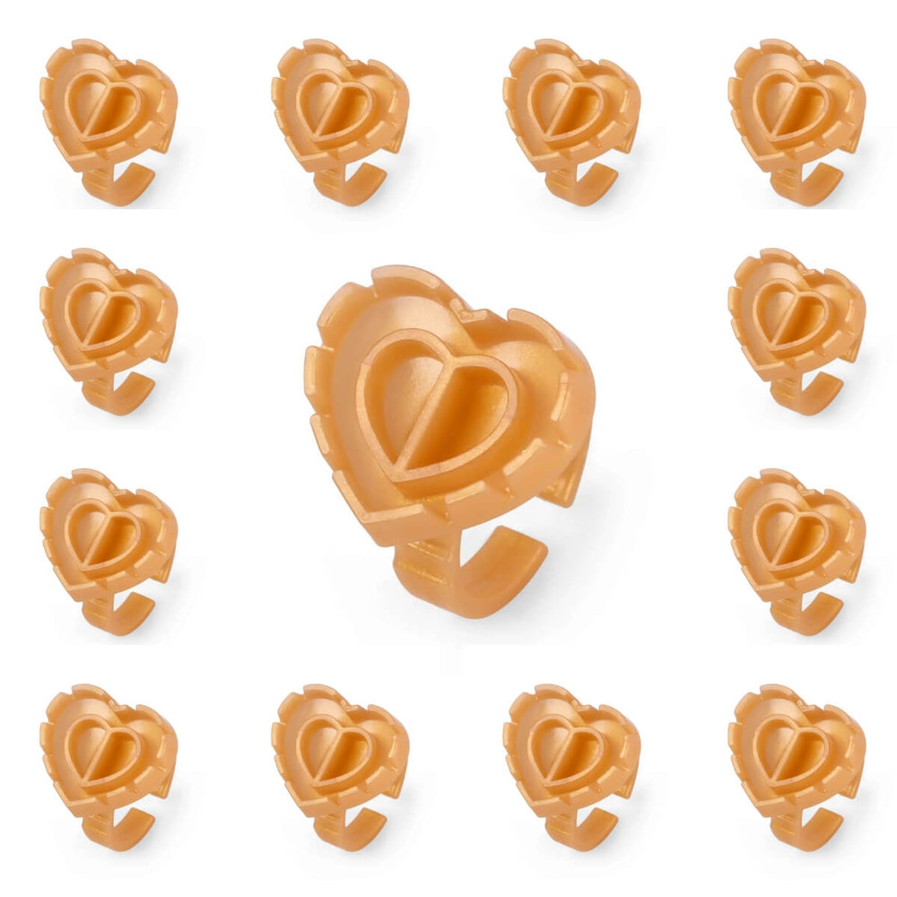 Gold Sweet Heart glue rings for lash extensions, 100/pack. 2-in-1 disposable adhesive holder for volume & classic lashes.