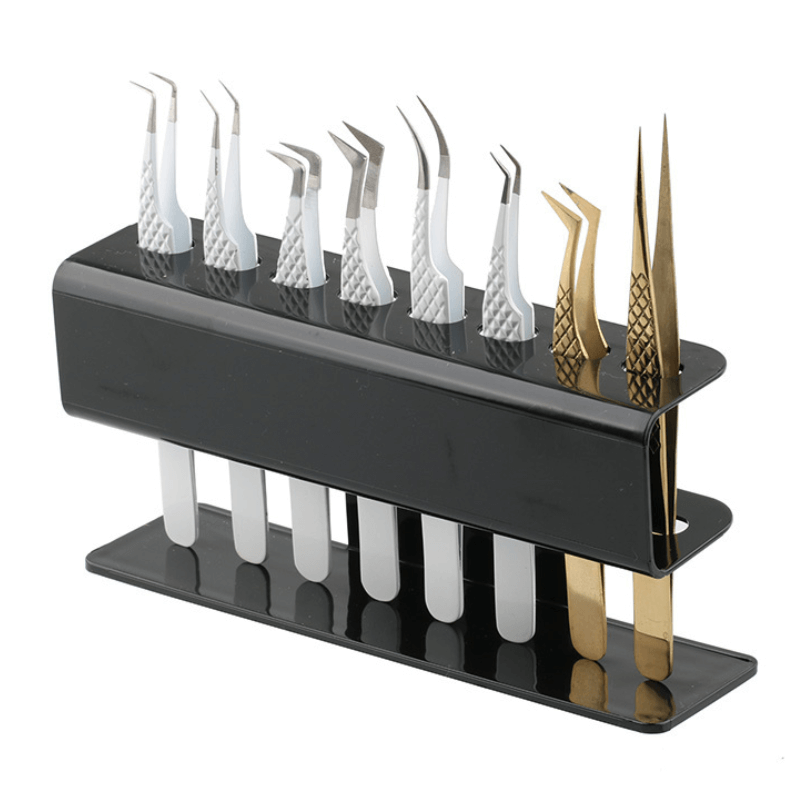 Black acrylic tweezer holder with multiple lash tweezers 