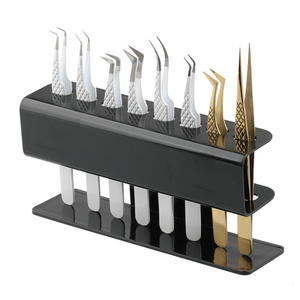 Black acrylic 8-slot tweezer display holder with multiple lash tweezers