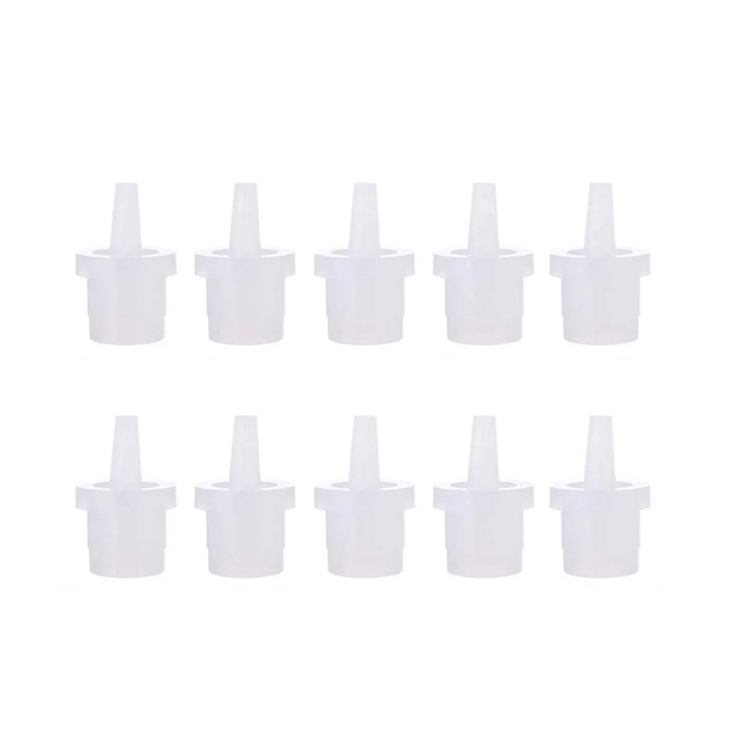 White replacement nozzles for lash glue, essential for lash extension application.