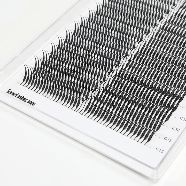 Contour laser print Anime Fox Spike eyelash extensions, wispy flared tips in tray.
