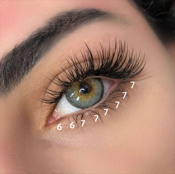 A close-up of an eye with professional Bottom Lash Extensions, showing varying lengths for a natural look.