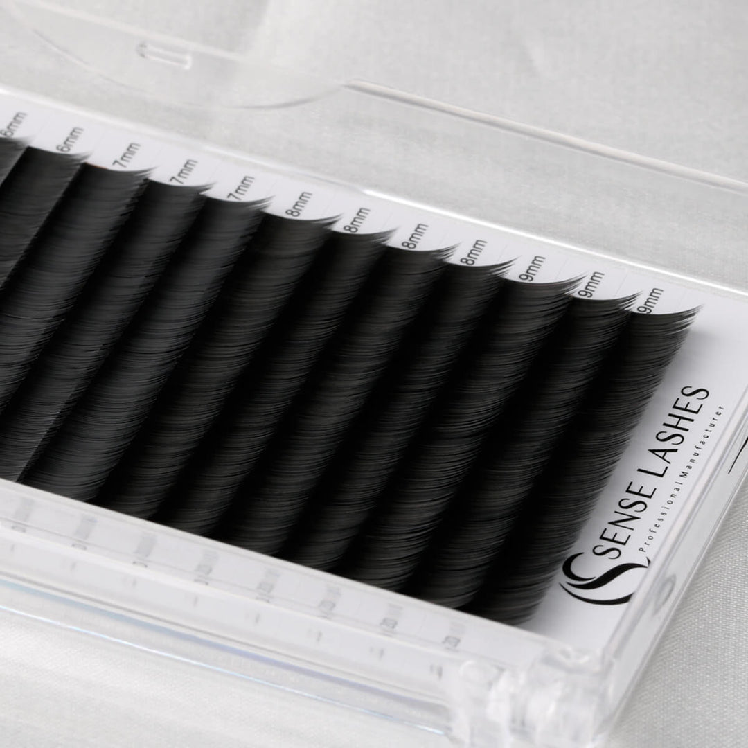 Bottom Lash Extensions by Sense Lashes: Close-up of deep black, matte finish faux mink lashes.