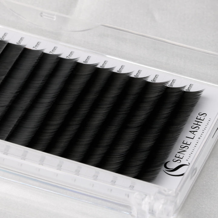Bottom Lash Extensions by Sense Lashes: Close-up of deep black, matte finish faux mink lashes.