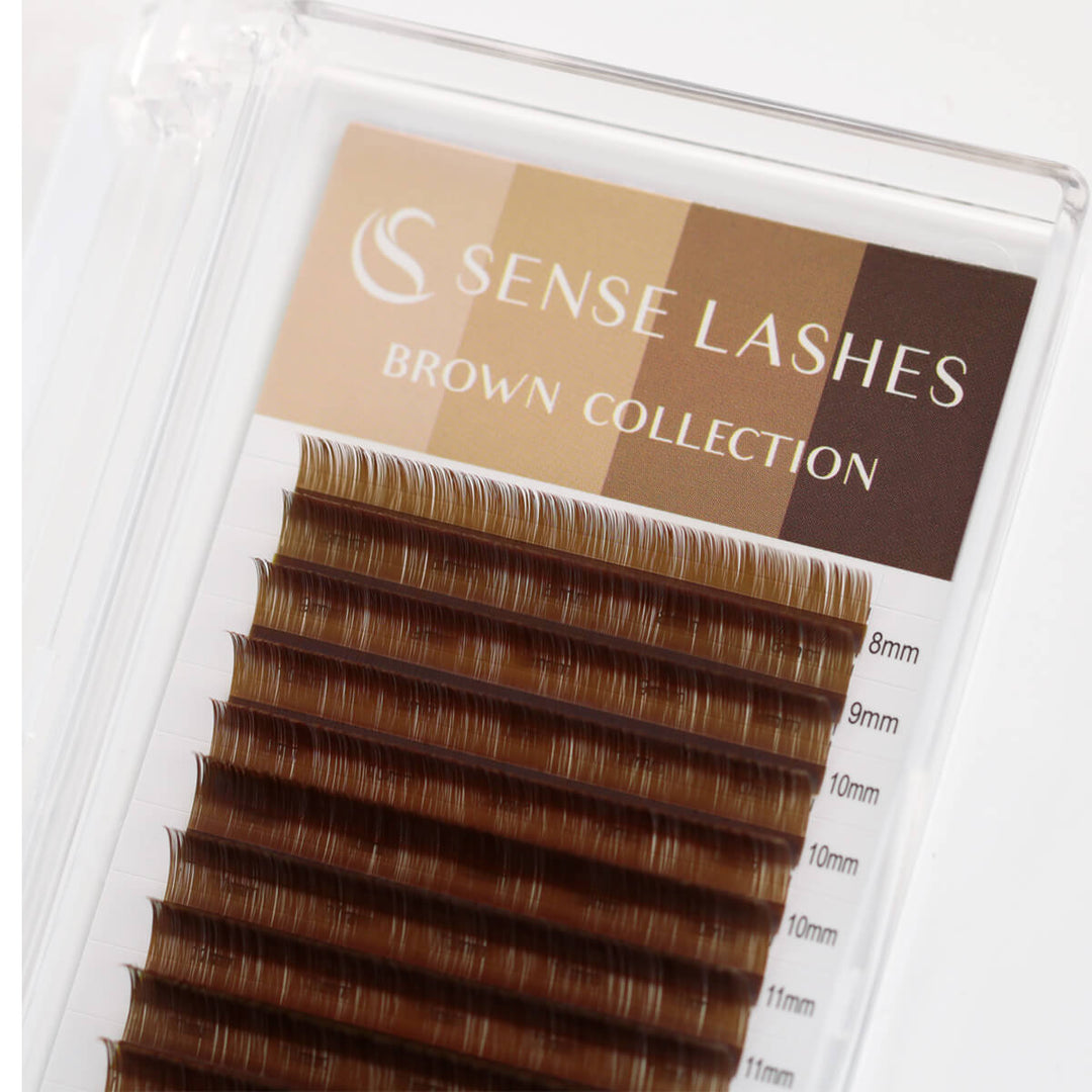 SenseLashes 0.07mm deep brown volume eyelash extensions in clear packaging, various lengths for a natural look.