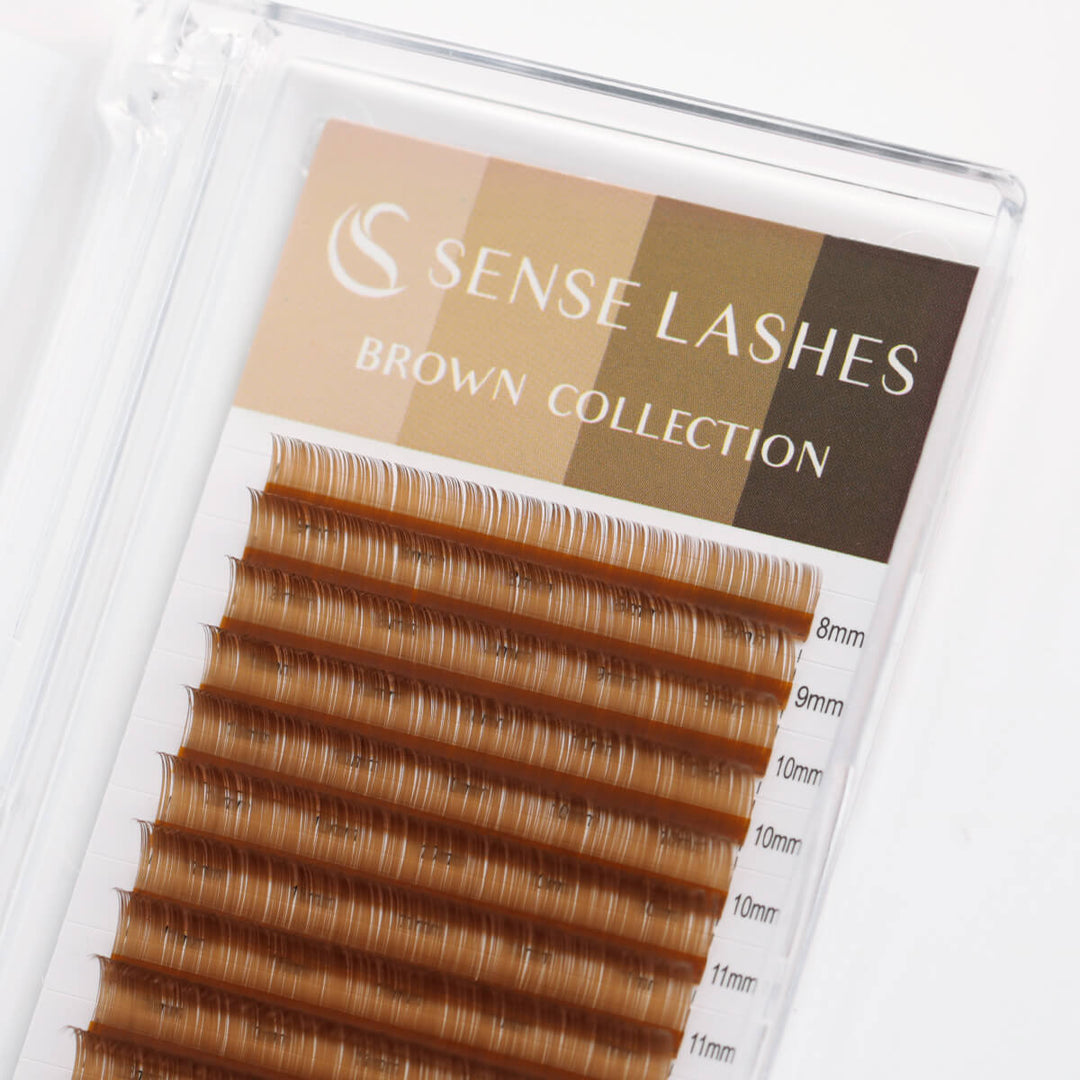 Light brown 0.07mm volume eyelash extensions from Sense Lashes. Ideal for fair complexions. Professional manufacturer.