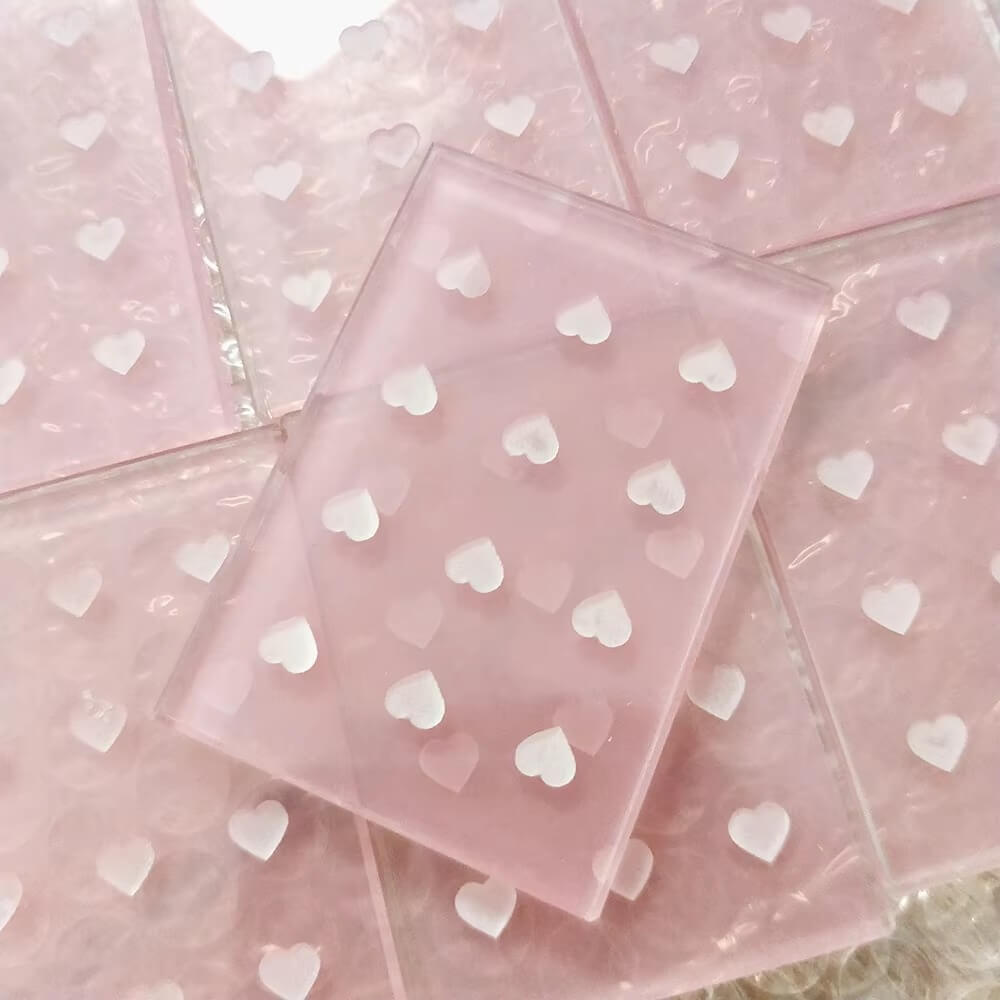 Crystal glue holder with heart-shaped wells, ideal for lash adhesive during eyelash extension application, salon supply.