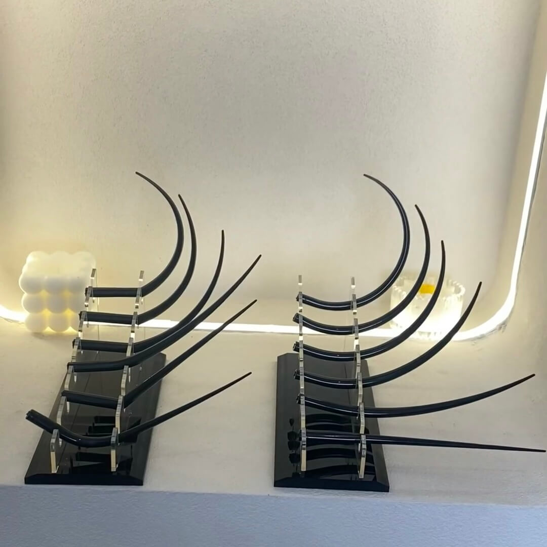Lash curl display for lash extensions, showcasing various curl styles for training and salon display.