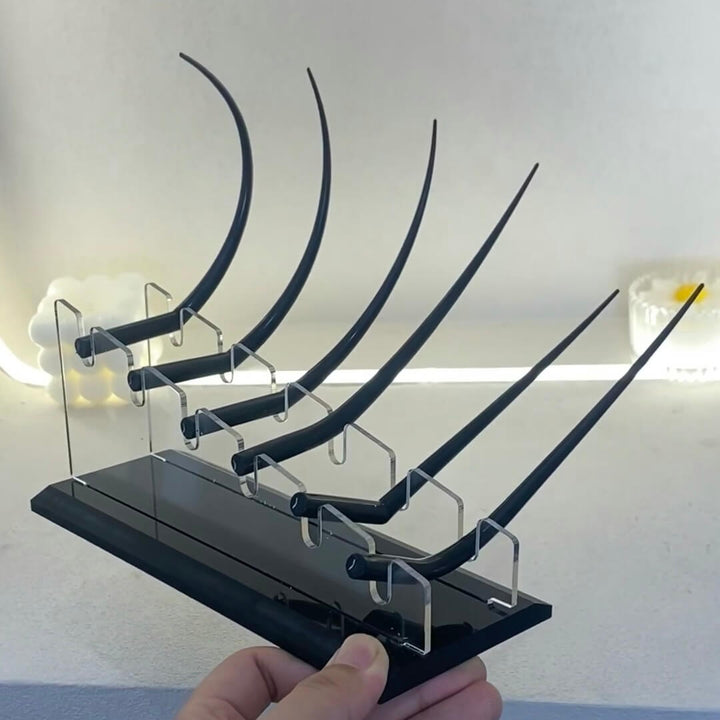 Black lash curl display for eyelash extensions, showcasing different curl styles for training and salon display.
