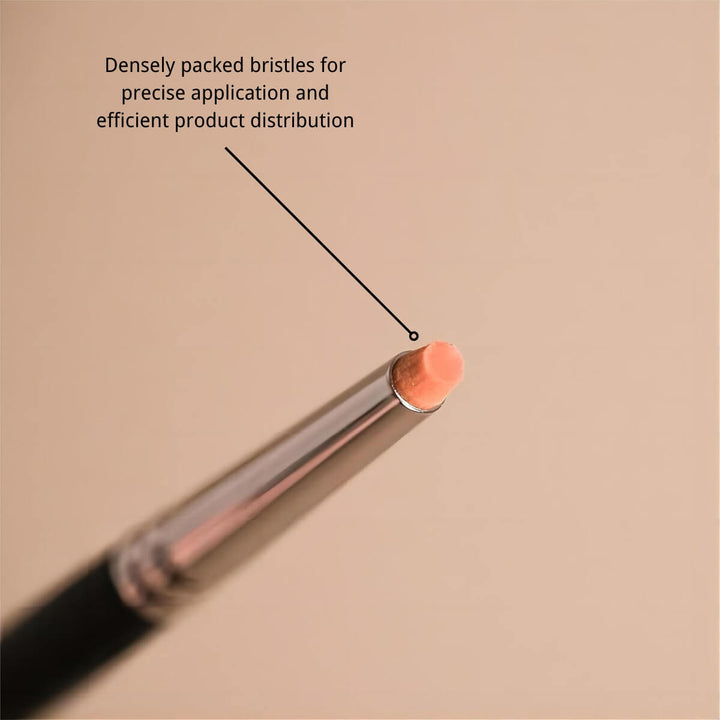 Close-up of SENSELASHES lash lift balm brush with dense bristles for precise application