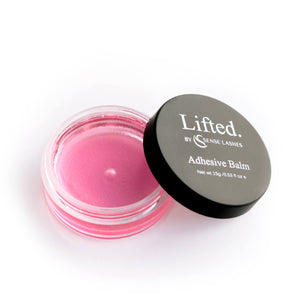 Pink Lash Lift Adhesive Balm in open jar with black lid, 15g