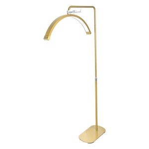Gold LED moon lamp on adjustable stand for eyelash extensions