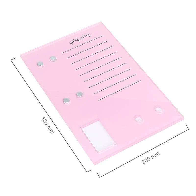 Pink magnetic lash tile for eyelash extensions. Features scale lines, lash icon, and magnetic holders for tweezers.