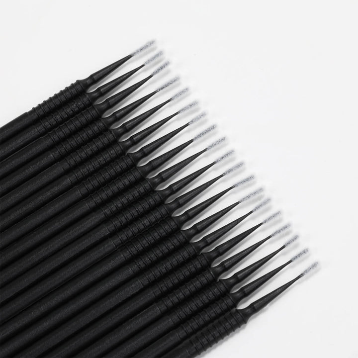 Black eyelash extension applicator brushes with fine tips for precise lash application