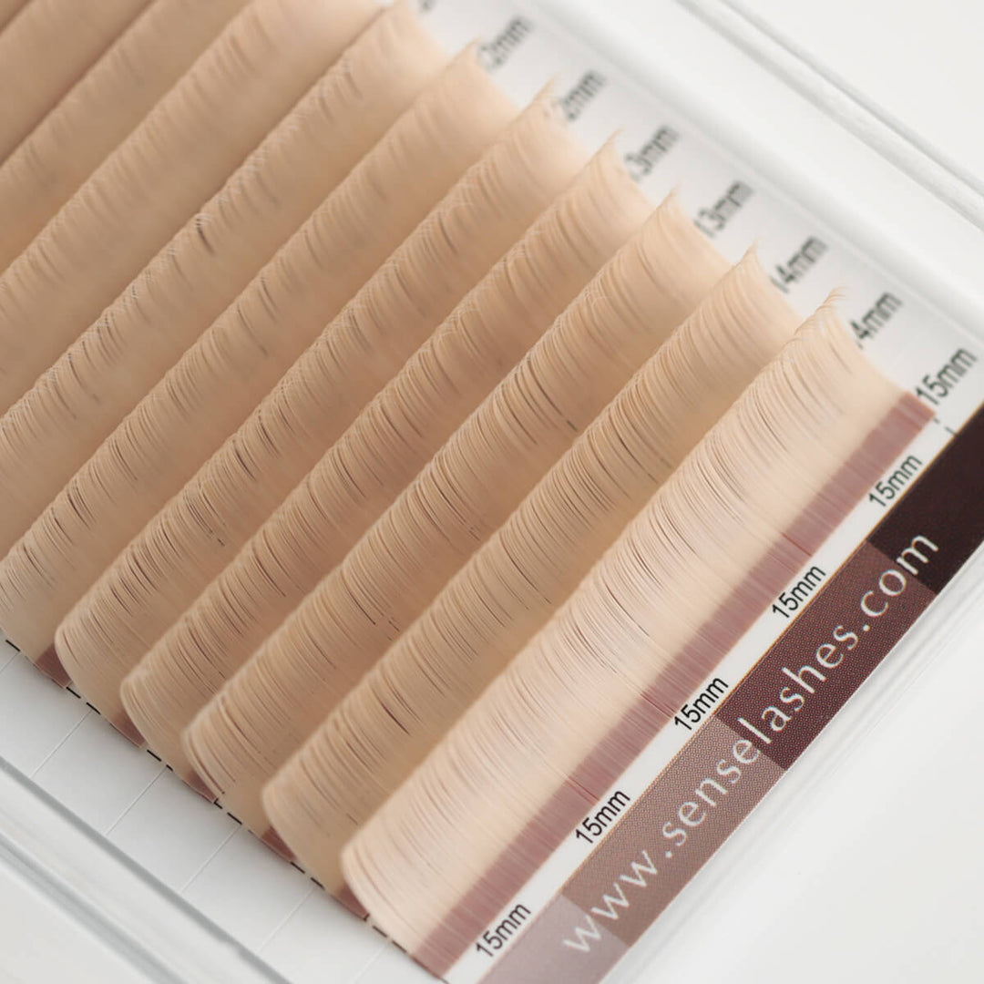 Platinum Vanilla Blonde Matte Brown Lash Extensions, 10-15mm lengths, in clear tray.