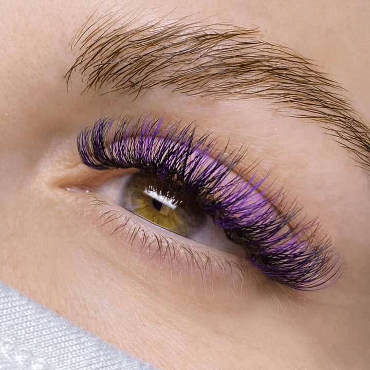 Purple eyelash extensions on eye, 0.05mm by SENSELASHES 