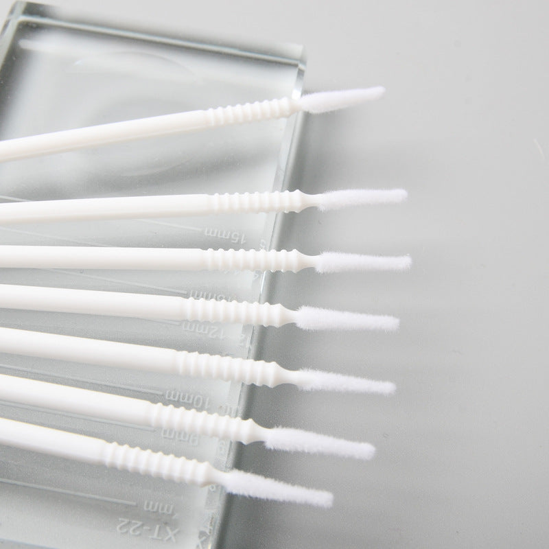 White microfiber lash applicators, perfect for precise eyelash extension primer and remover application.