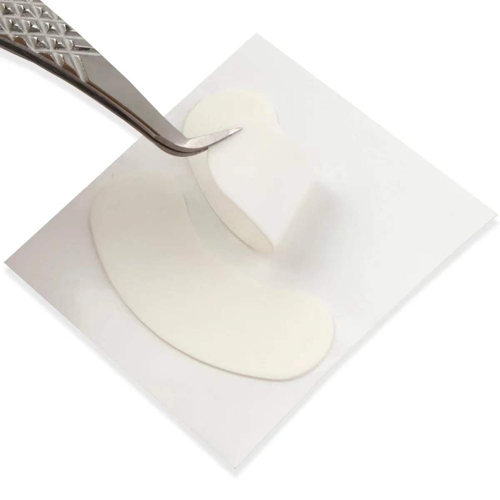 Tweezers holding under eye foam pad for eyelash extensions 
